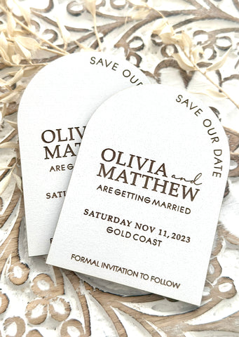 White coated arch save the date magnets