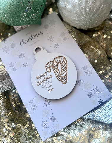Combined candy cane bauble and backing card