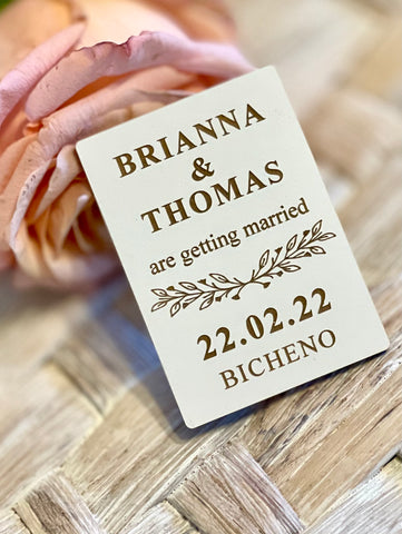 White engraved save the date magnet