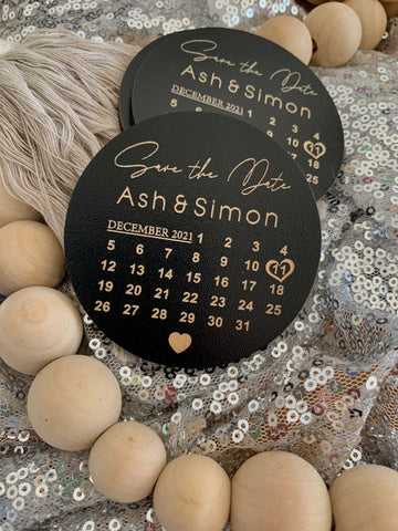 Black coated wooden engraved save the date magnet